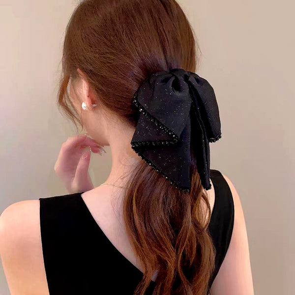 Elegant Starlight Streamer Bow Hair Band