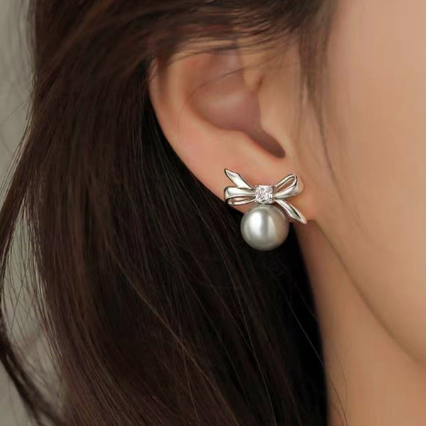 Sterling Silver Elegant Pearl And Bow Stud Earrings