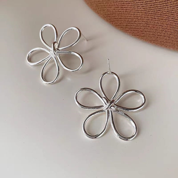 Sterling Silver Hollow Flower Knot Earrings